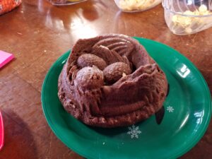 A cake in the shape of a dragon curled around its eggs